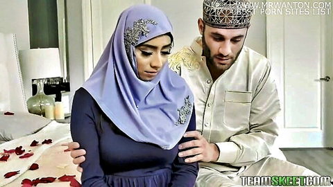 Hijab Muslim woman in modest attire comforted by man in traditional thobe