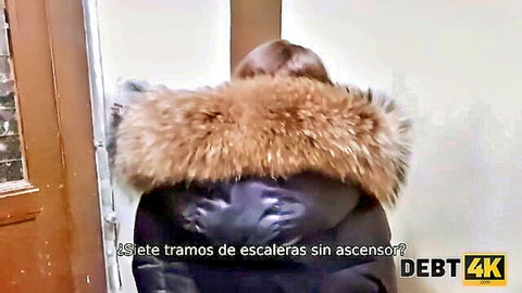 Eveline Dellai climbs 25 flights in fur-trimmed jacket for DEBT4K