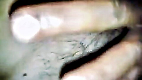 Blurry closeup of amateur wife's hairy pussy being fingered