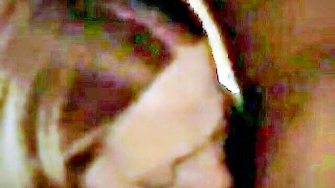 Blonde woman with open mouth in ecstasy as man grips her head in rough sex