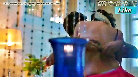 Two Indian wives in lingerie embracing intimately from behind