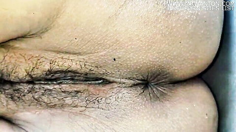 Close-up of Indian bhabhi's hairy pussy and round ass, explicit view