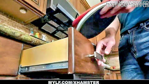 Guy in jeans grabs thick red dildo from kitchen drawer