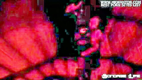 Blurry red-tinted BDSM scene with distorted naked bodies in bondage play showing tits and curves
