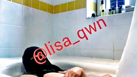 Niqab beauty Lisa in steamy bathtub tease, veiled solo seduction