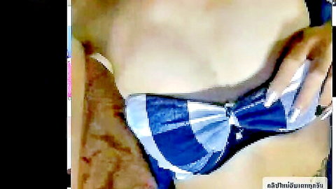 Sexy Thai babe teasing huge cleavage in blue checkered bow bra