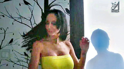 Brunette cougar dances seductively in yellow tube top flaunting huge tits and curvy body