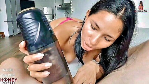 Asian babe in lingerie uses rotating stroker toy on boyfriend's cock