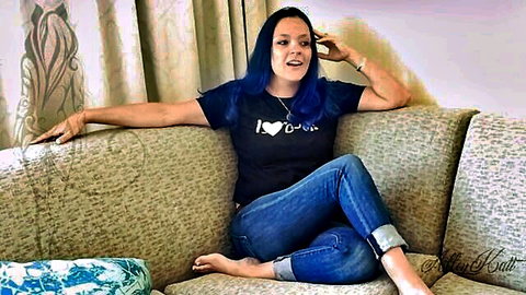 AlleyKatt blue-haired hotwife in tight jeans and t-shirt, seductive barefoot pose
