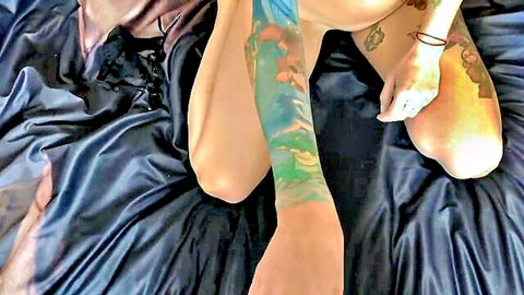 Tattooed amateur babe spreads legs wide for intense fingering in shaved pink pussy