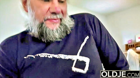 Bearded old man smiling close-up in dark shirt for old and young taboo porn