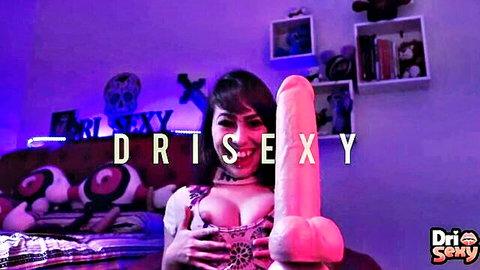 Sexy brunette in cleavage dress holds large dildo for ASMR JOI guided handjob