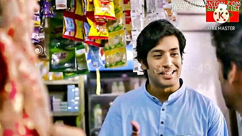 Cute Indian wife in store with husband's smiling friend, teasing affair