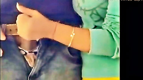 Indian girl handjob on boyfriend's exposed dick in amateur clip