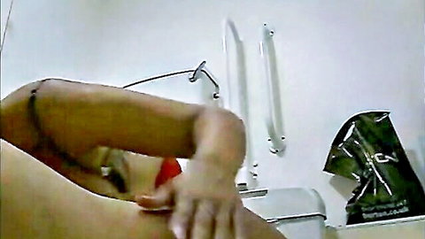 Arab Muslim woman bending over in explicit solo pose, dark skin curves