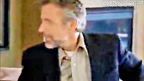Mature man in suit gazing intensely in stepmom-son cheating sex scene