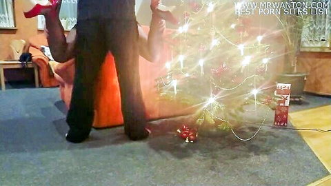 Woman in red heels bent over for doggy style fuck by Christmas tree