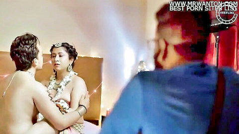 Desi wife with big ass in traditional lehenga embraced by lover in intimate pose