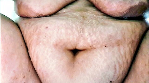 Beate's amateur close-up of hairy pussy and chubby belly