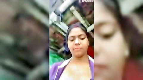 Sexy Bangladeshi wife closeup with pouty lips and dark eyes in purple top