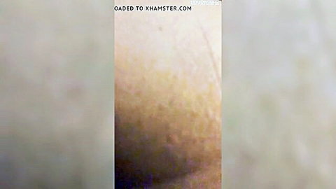 Blurry gray adult video thumbnail loaded to xHamster with casting watermark overlay