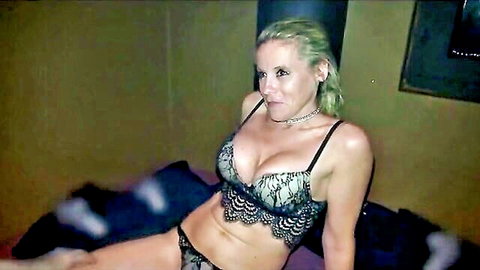 Sabrina in sexy green lace lingerie, blonde bombshell posing seductively