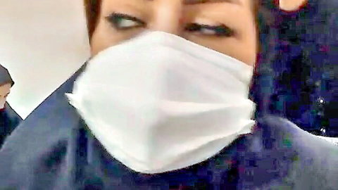 Iranian MILF with seductive eyes in white face mask close-up