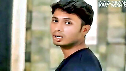 Handsome Indian man in black t-shirt, teasing pose from Bitch Ft Pooja K video