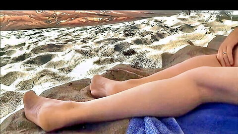 Nude sleeping woman on beach, bare legs and feet filmed secretly
