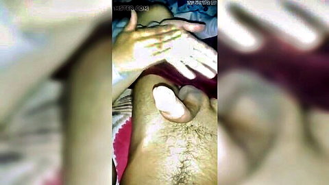Blurry amateur handjob on man's penis in threesome with husband and friend