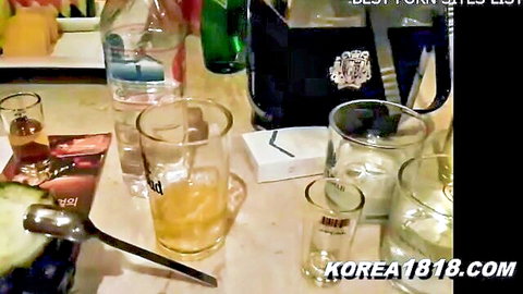 Sexy Korean girls partying with drinks in KTV karaoke room