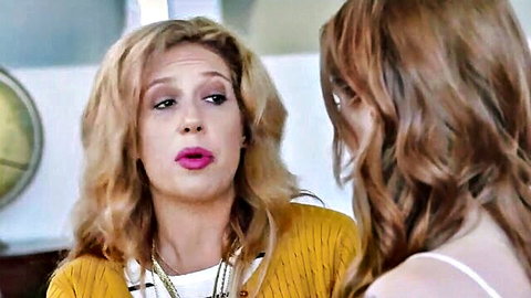 Blonde mature woman in yellow sweater chats with redhead teen in white tank