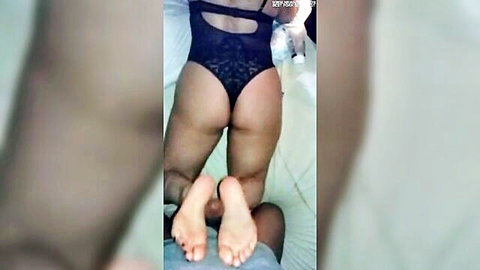 Blonde Latina in black lace lingerie, thick ass and feet for footjob view