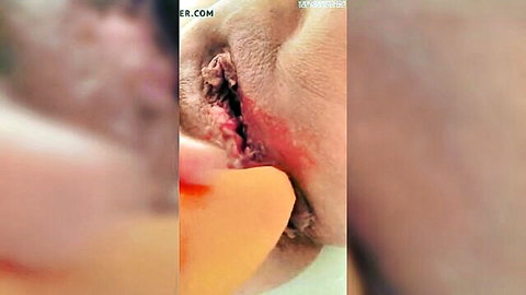 Woman masturbating with carrot insertion close-up HD porn
