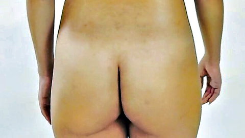 Petite Asian teen bends over spreading shaved pussy and tight asshole