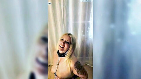 Smiling big-titted blonde German wife topless in collar with leash exposing huge tits