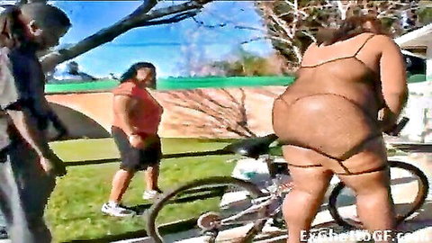 Thick black ex-girlfriend bends over bike showing huge ass in strappy lingerie
