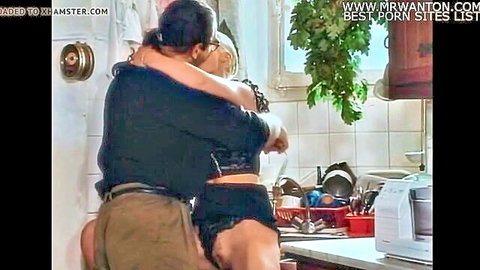Vintage 1994 couple in kitchen embrace, blonde in black lingerie, restored HD