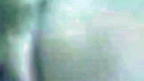 Blurry South Asian woman with exposed tits and dark hair in steamy encounter