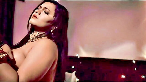 Topless Desi bhabhi teasing with hands on big tits, long hair and jewelry