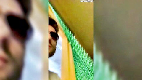 Blurry man in sunglasses peeking through green fence in Corona Part 2 Anal at Work MILF video
