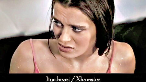 Shocked brunette babe with wet hair and pink top looking surprised in intense close-up