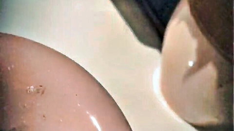 Vicky Hundt smoking seductively, close-up of curvaceous body
