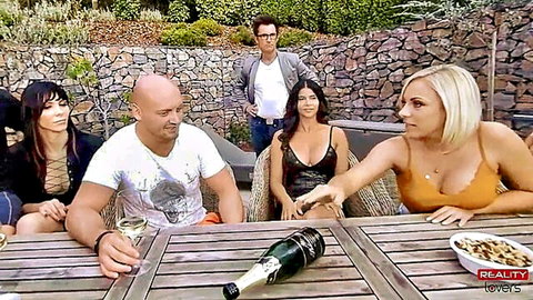 Micaela Schäfer and Jolee Love in lingerie at outdoor champagne party