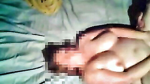 Nude Asian wife lying on bed, loud moans distort mic