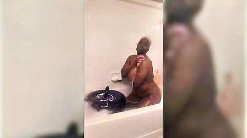 Muscular ebony guy's fat ass riding huge purple dildo in steamy bathtub solo