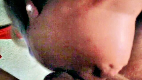 Woman deepthroating thick cock balls-deep with nose buried in crotch during intense face fuck