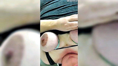 Man's hand squeezing massive pale big tits with erect pink nipples exposed from shirt