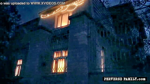 Perverse Family Christmas Eve orgy teaser: Lit house at night with holiday lights