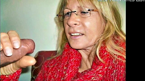 Blonde granny in red sweater gives handjob to hard cock